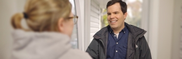 Service professional welcomed by homeowner