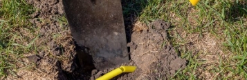 Damaged gas line with a shovel